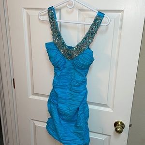 B. Darlin teal dress with rhinestones